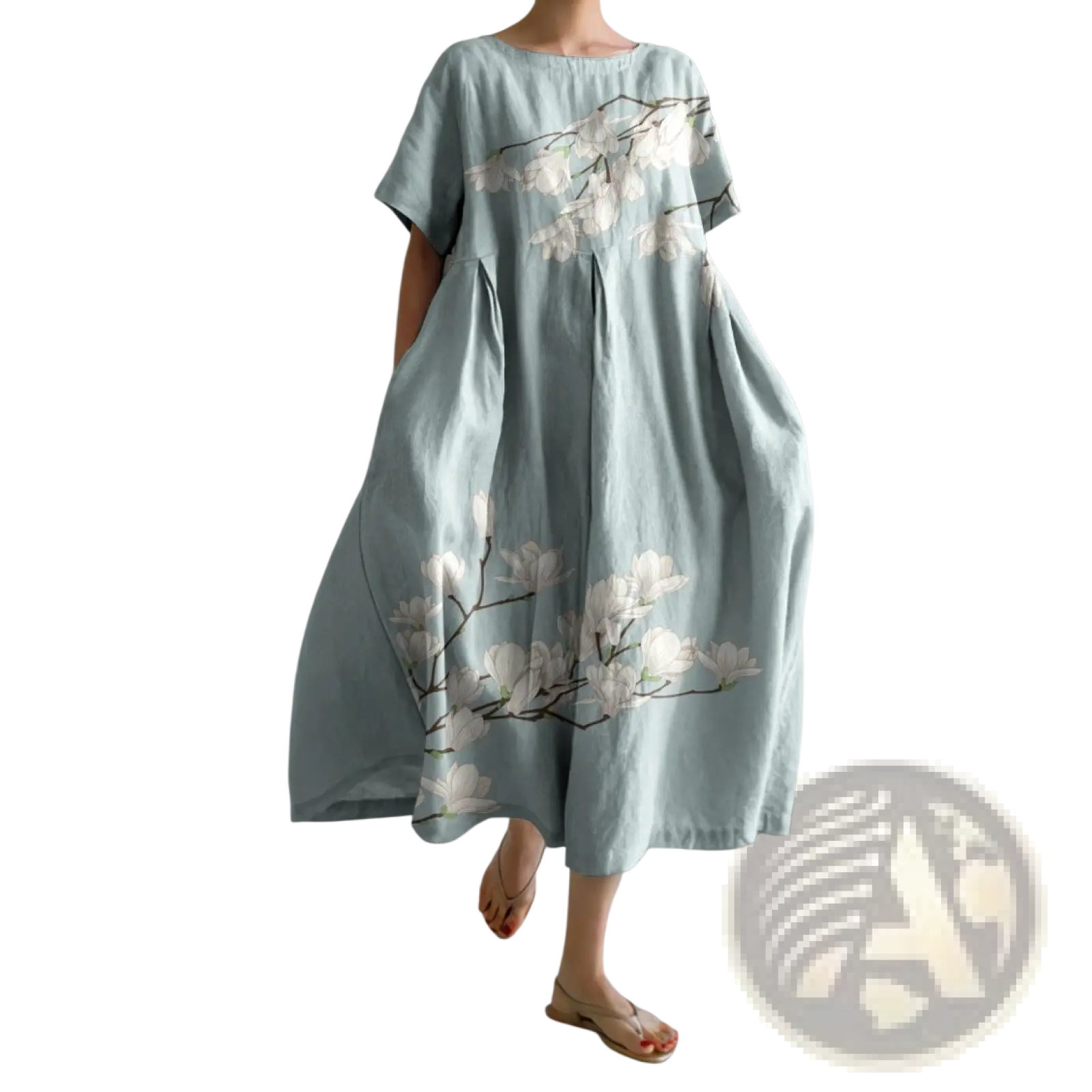 Floral print a-line plus size linen maxi dress in soft mint green with white magnolia blossom embroidery and dark branches
