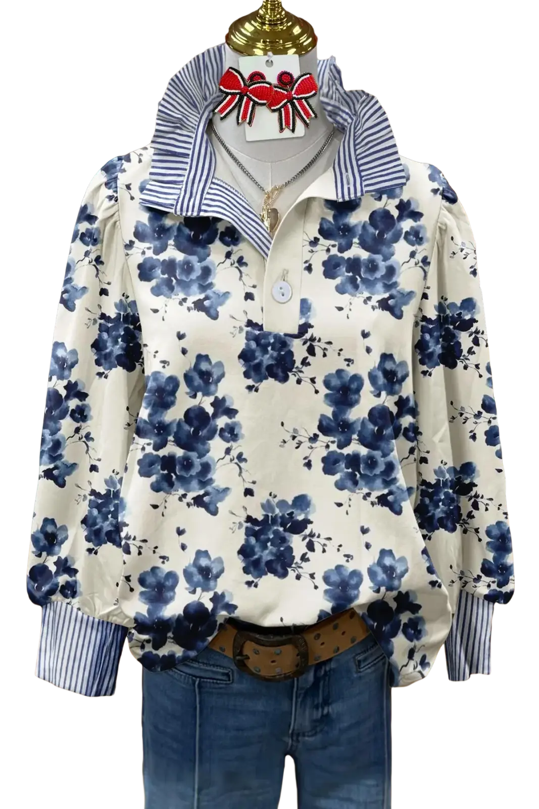Blue floral print long sleeve casual shirt with striped collar and cuffs displayed on a mannequin