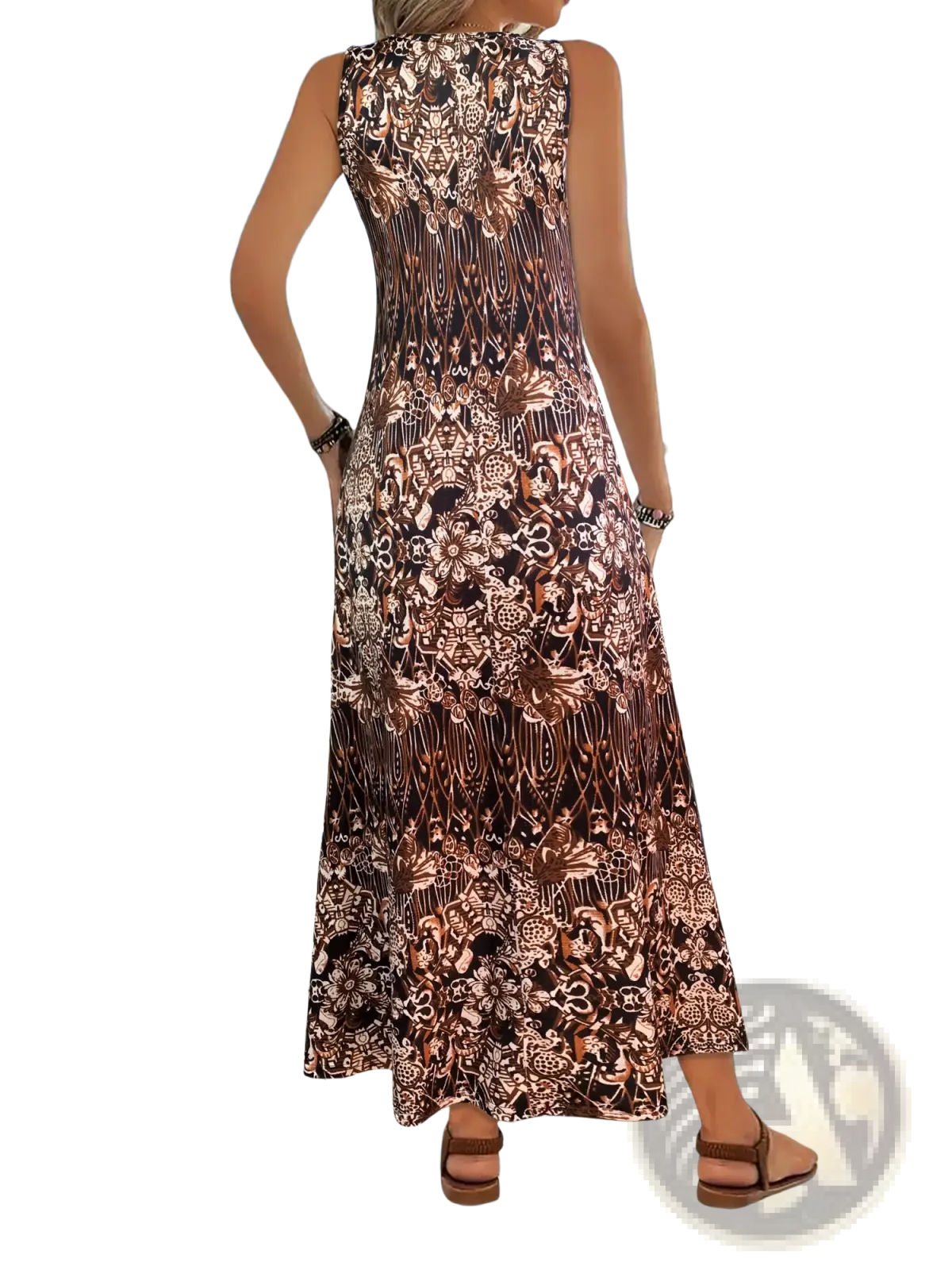A sleeveless floor-length floral print maxi dress in dark brown and copper with intricate lace-like detailing