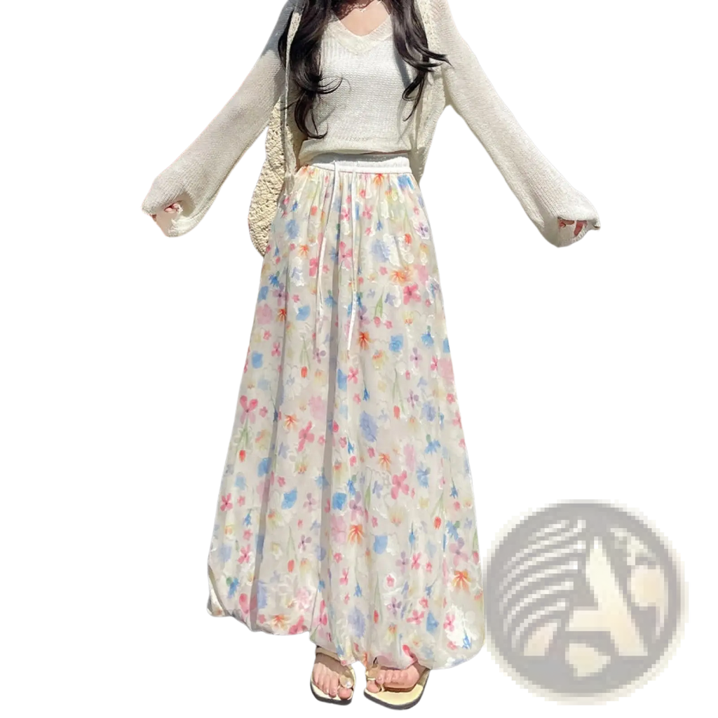 Floral print midi skirt with sheer lightweight fabric and pastel multicolored blossoms on an off-white base