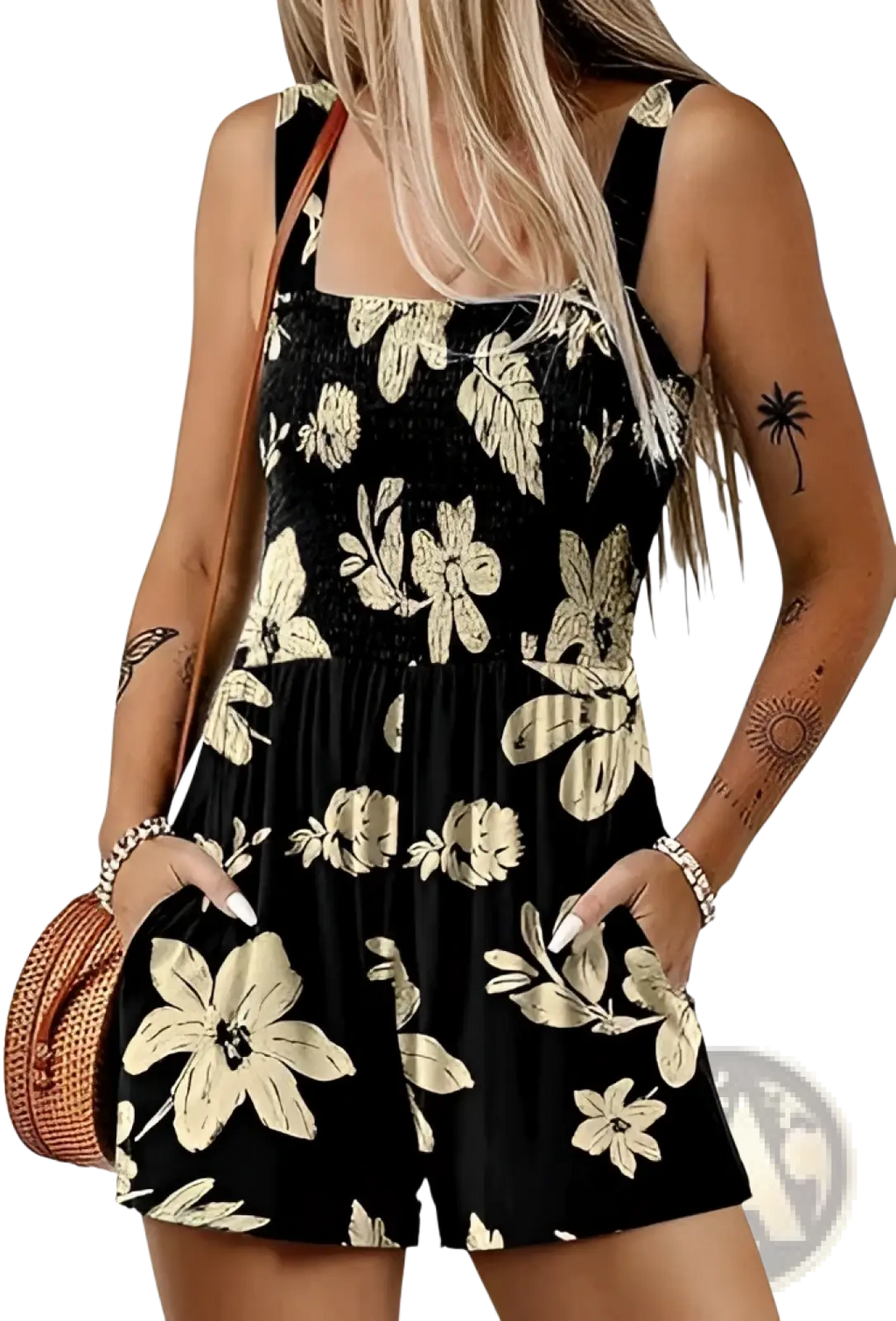 Black floral print romper with cream flowers and leaves featuring a square neckline smocked waistband and front pockets