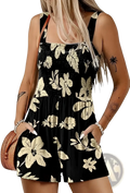 Black floral print romper with cream flowers and leaves featuring a square neckline smocked waistband and front pockets