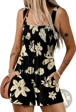 Black floral print romper with cream flowers and leaves featuring a square neckline smocked waistband and front pockets