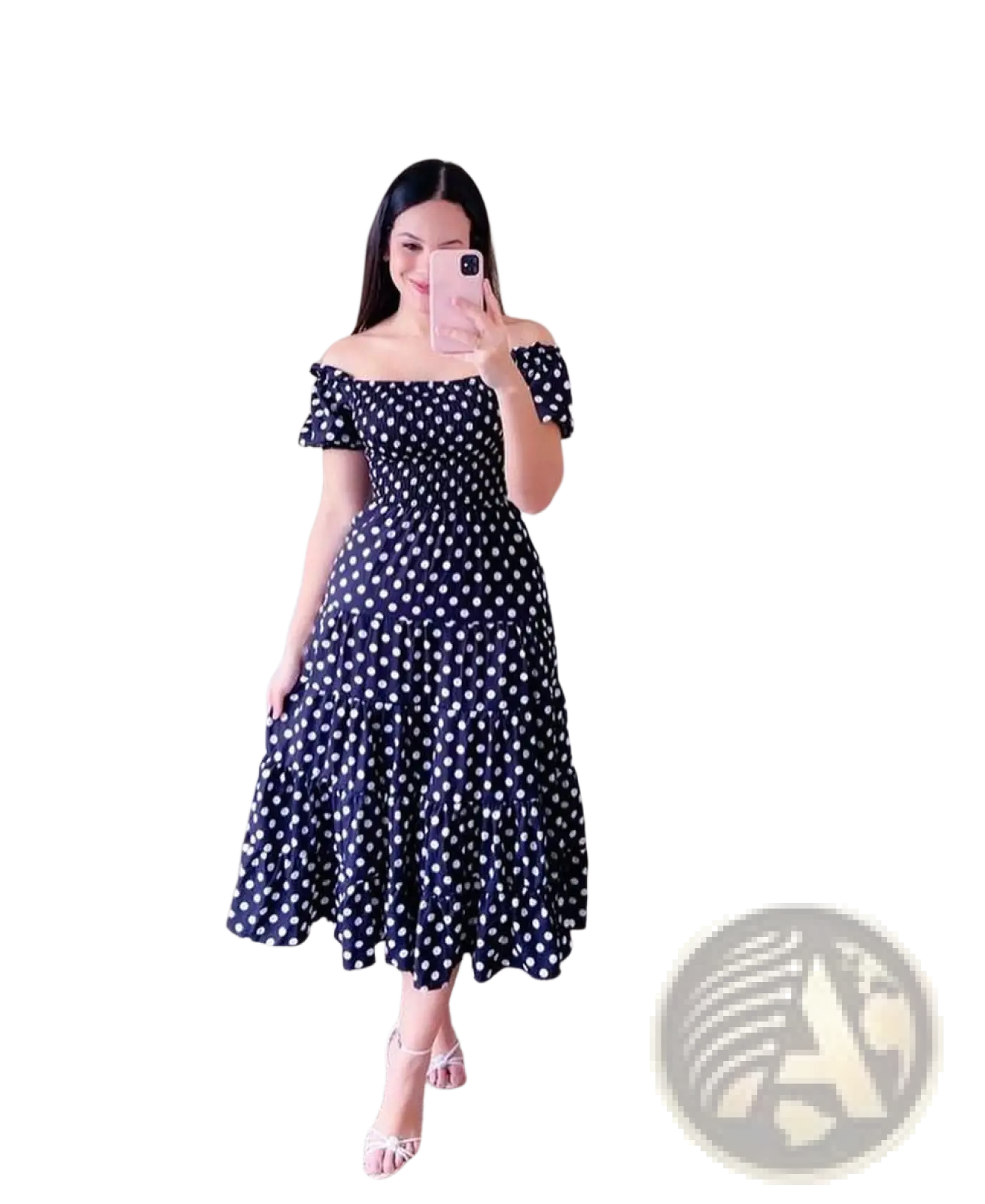 A navy blue off-the-shoulder midi dress with white polka dots and ruffled sleeves in a floral print smocked tiered style
