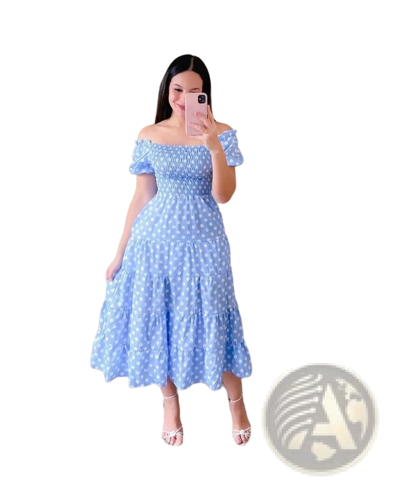 A light blue off-the-shoulder tiered midi dress with white polka dots and a smocked bodice featuring a square neckline