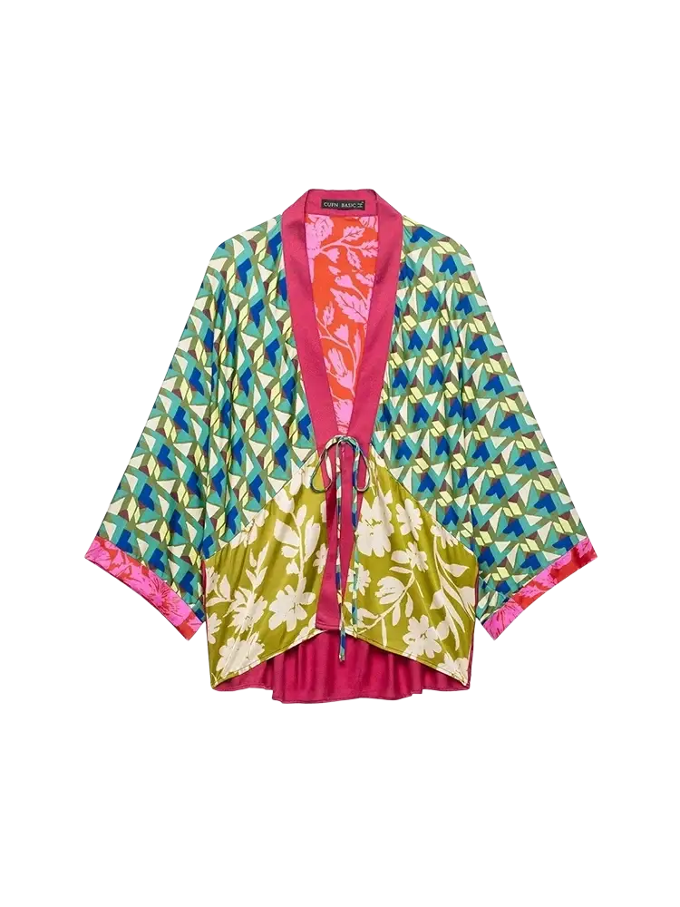 Floral print two piece midi skirt set with a vibrant teal green and pink patterned kimono style jacket featuring floral and geometric designs