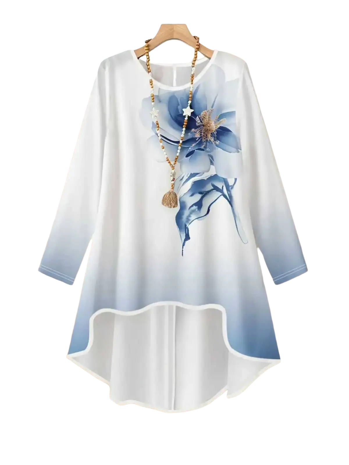 A flowing white and blue gradient long-sleeved top with a large floral print hanging on a wooden hanger from a two-piece outfit set