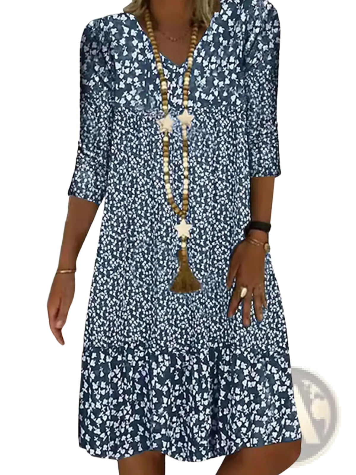 A navy blue and white floral print v neck midi dress with three quarter sleeves made of lightweight fabric