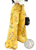 Yellow floral print wide leg denim pants featuring vibrant floral patterns and relaxed fit for casual wear