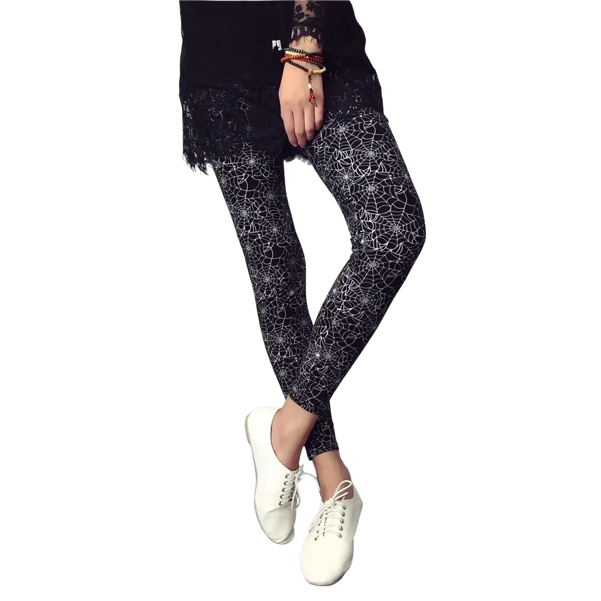 Black floral print workout leggings for women with white spiderweb pattern designed for exercise and comfort