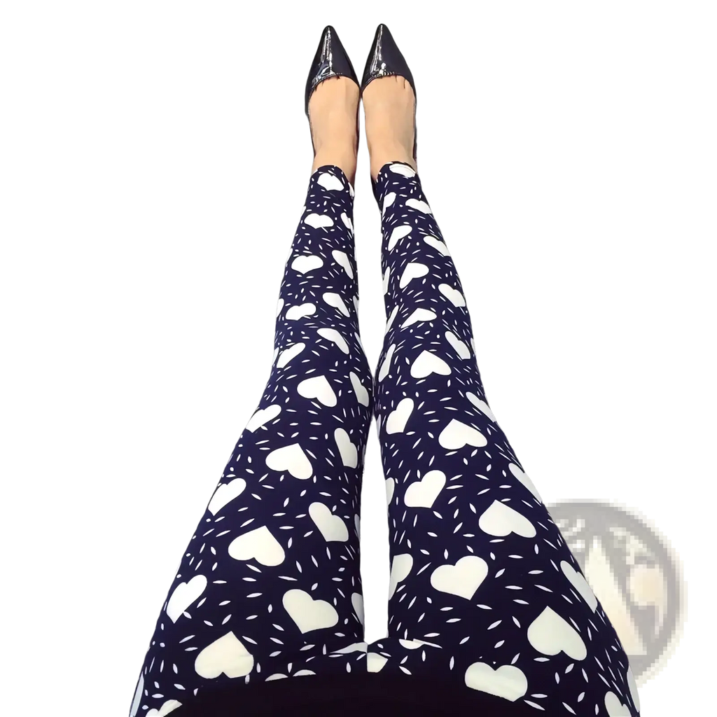 Black floral print workout leggings for women featuring white heart patterns and small decorative dots