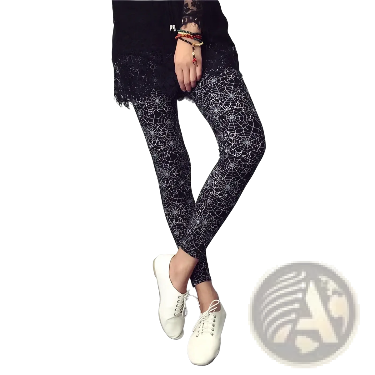 Black floral print workout leggings for women with white spiderweb pattern designed for exercise and comfort
