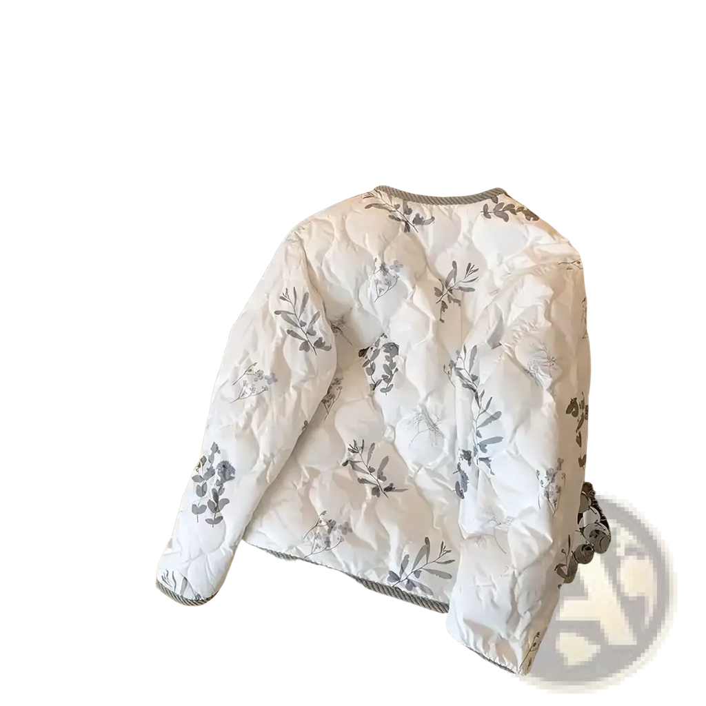 White quilted bomber jacket with gray botanical prints and ribbed trim for winter wear in Y2K style