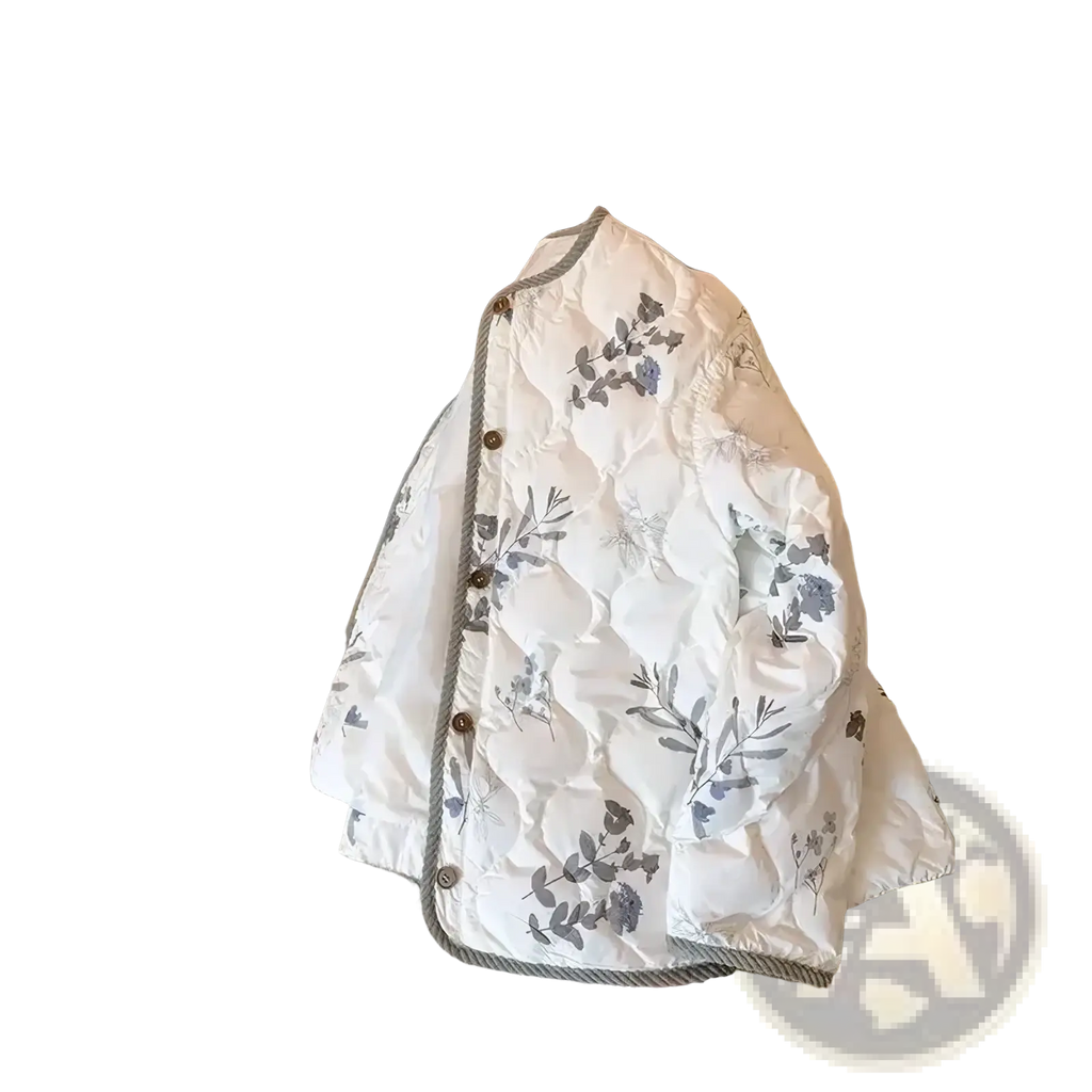 A white quilted puffer jacket with a gray floral pattern brown buttons and matching trim for winter wear