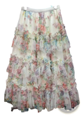 A delicate floral tulle fairycore skirt with pearl trim featuring pastel sheer ruffled layers and a white elastic waistband