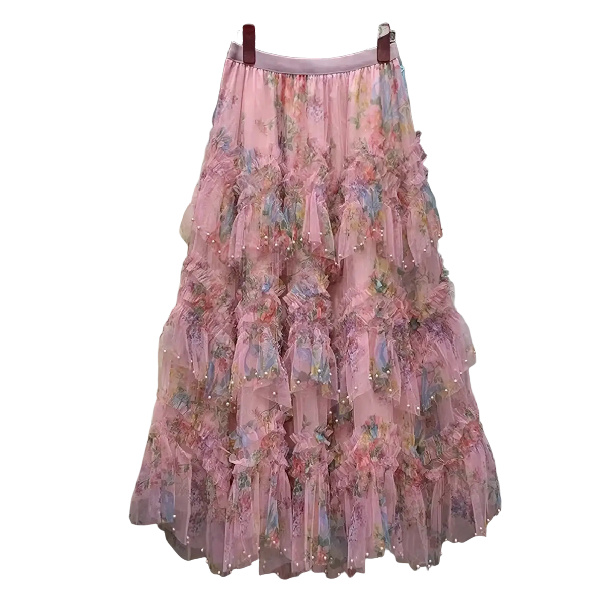 A delicate pink floral tulle skirt with tiered ruffles and pearl trim inspired by y2k fairycore fashion