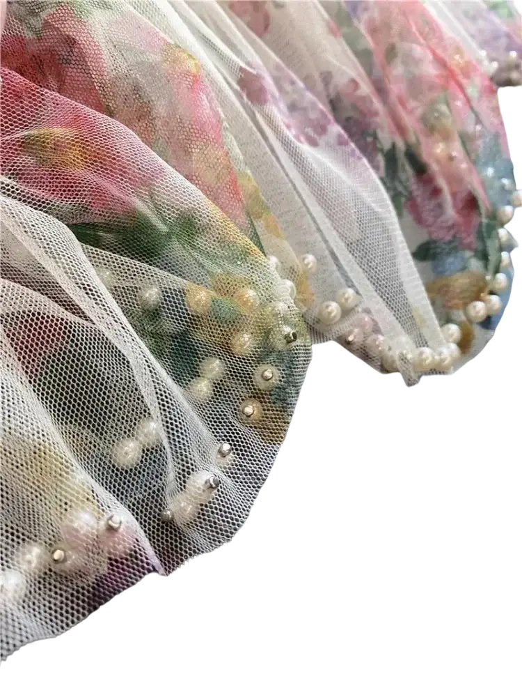 Floral tulle fairycore skirt with delicate sheer fabric ruffled edge and pearl trim in soft pastel colors