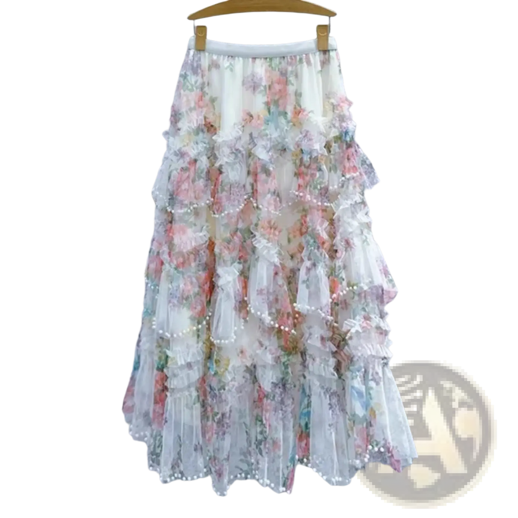 A delicate tiered floral tulle fairycore skirt in soft pastel hues with lace and pearl trim y2k style