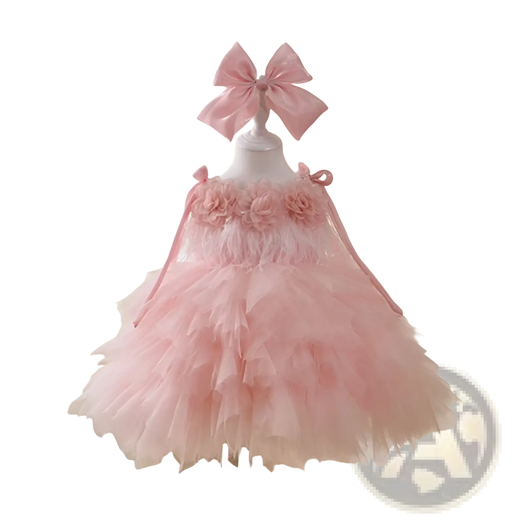 Delicate pink floral tulle tutu flower girl dress with satin bow for weddings and special occasions