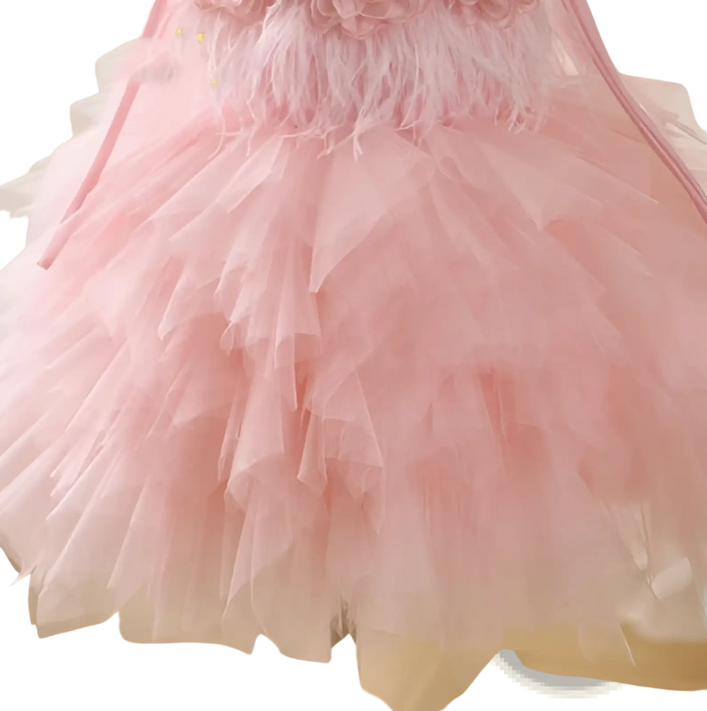 Floral tulle tutu flower girl wedding dress with delicate pink tulle skirt, soft feather accents, and floral waist embellishment