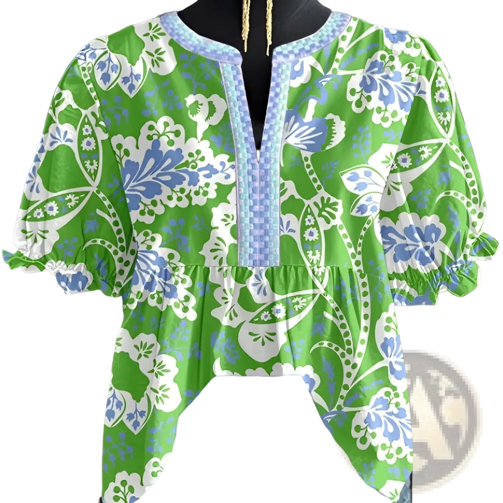 Vibrant green floral v-neck ruffled sleeve blouse with blue white patterns and light blue lace trim detailing