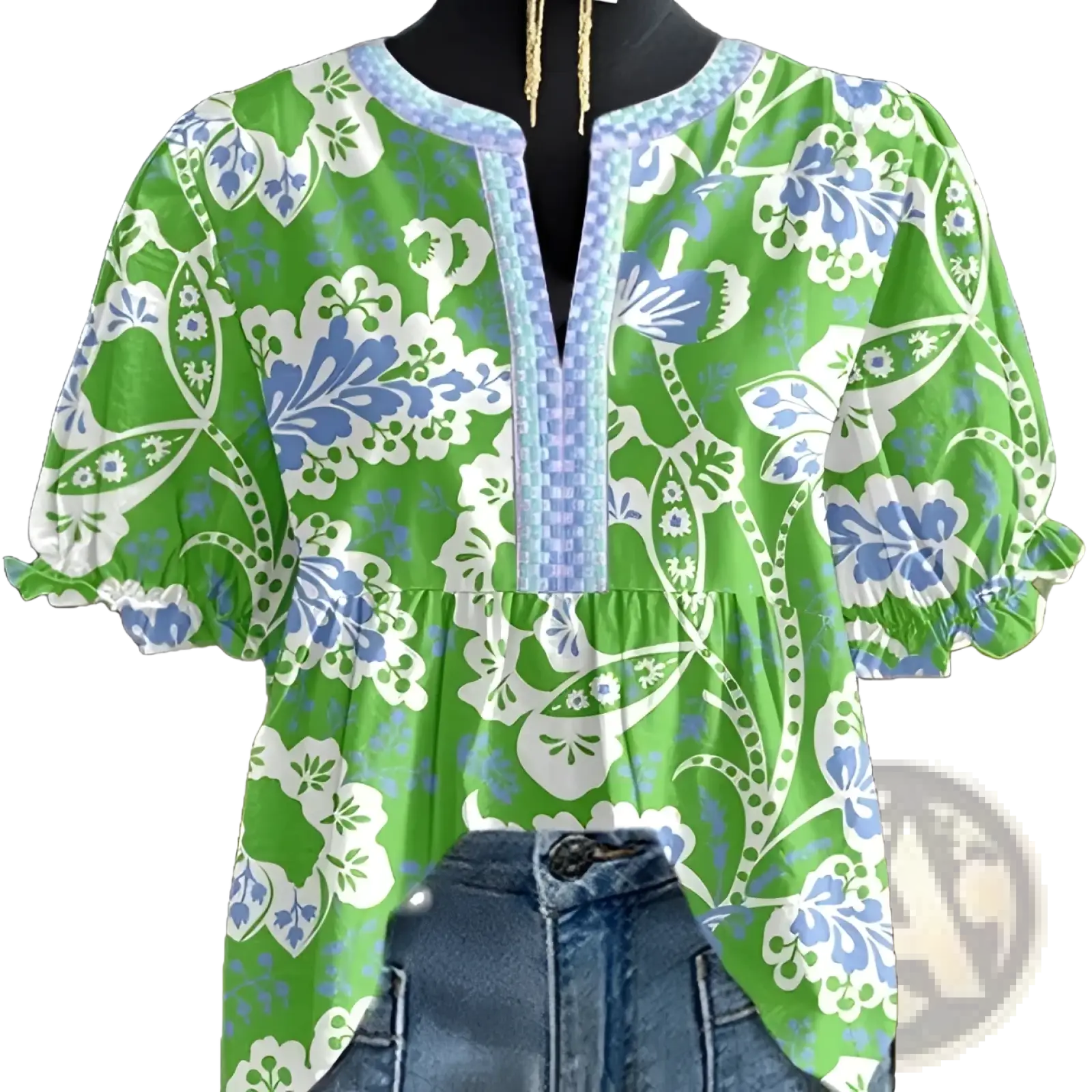 Vibrant green floral v-neck blouse with blue and white patterns and light blue beaded trim on ruffled sleeves