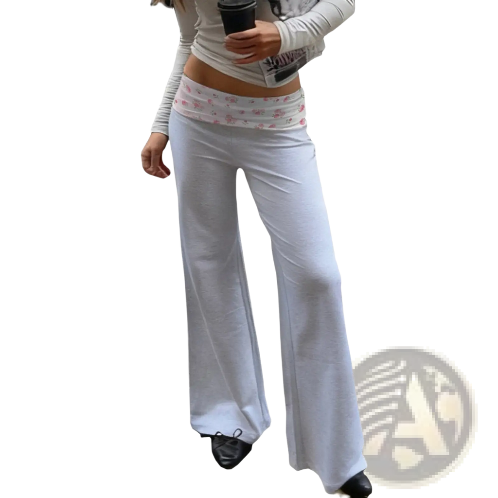 White wide-leg pants with a pink floral-patterned elastic waistband perfect for casual and stylish wear