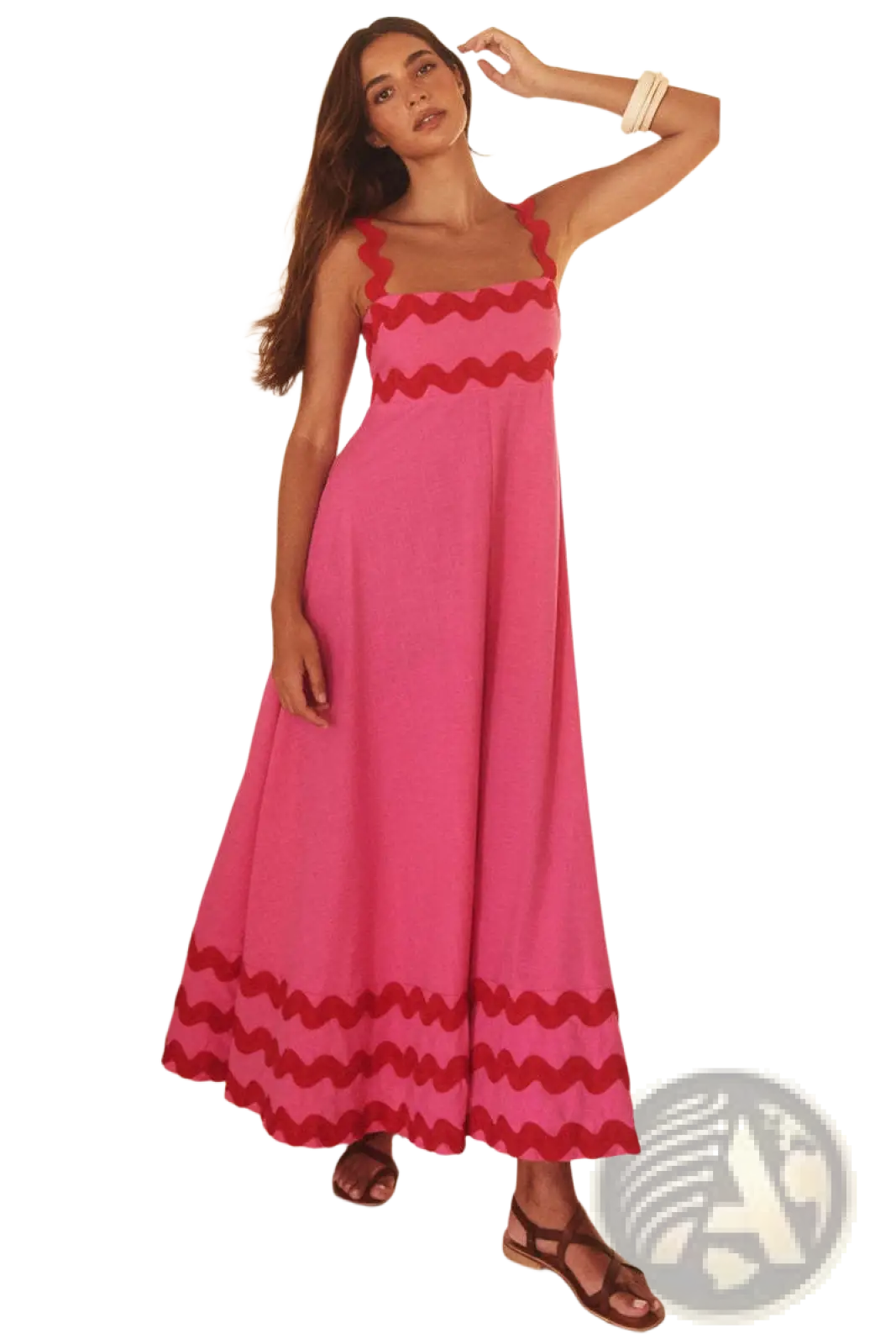 A vibrant pink floral wavy trim a-line beach maxi dress with bold red trim crafted from lightweight fabric
