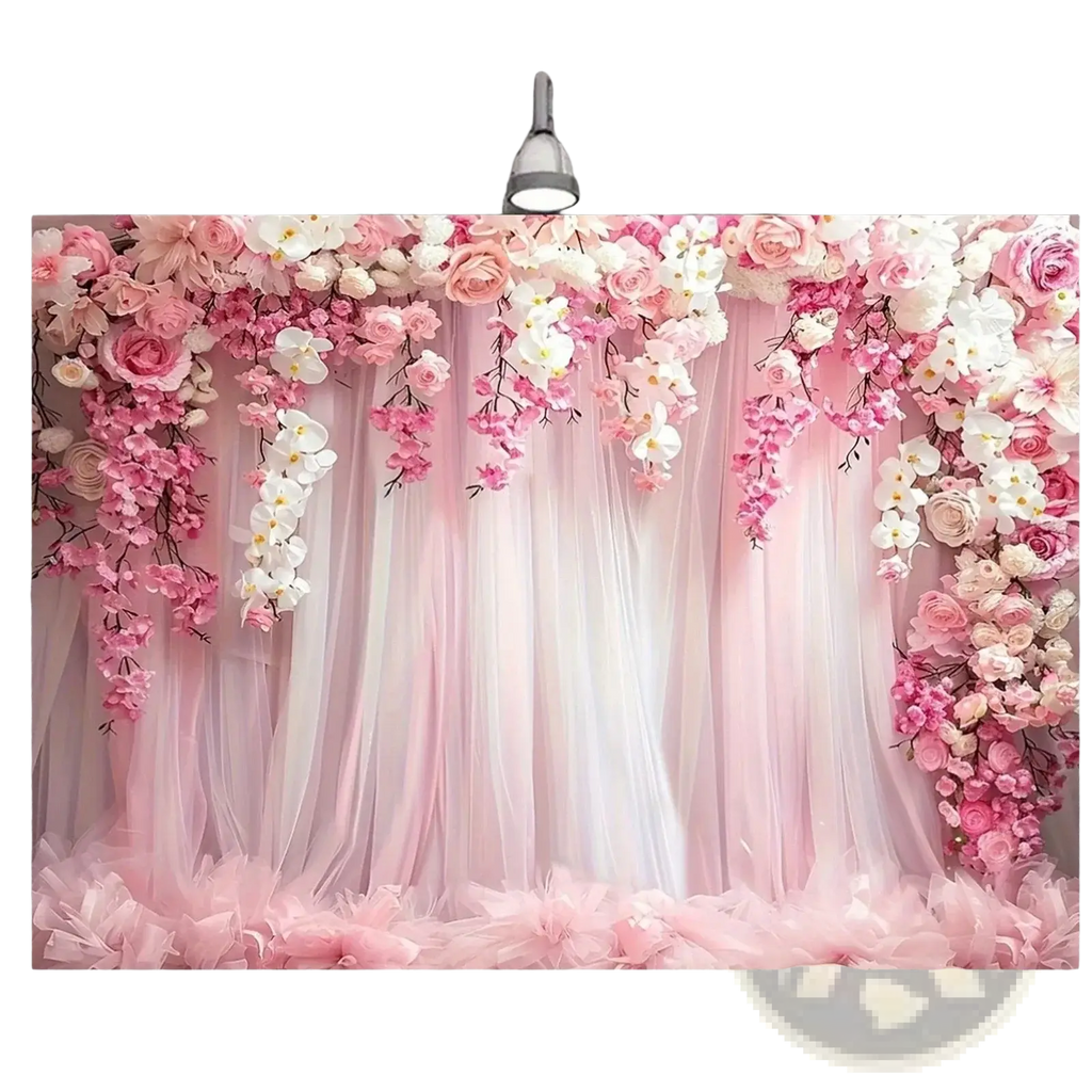 Floral wedding backdrop with pink and white cascading roses and sheer tulle curtains for elegant events