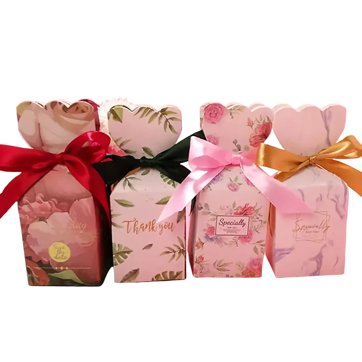 Pink floral wedding favor boxes with heart-shaped tops and satin ribbons for elegant gift packaging