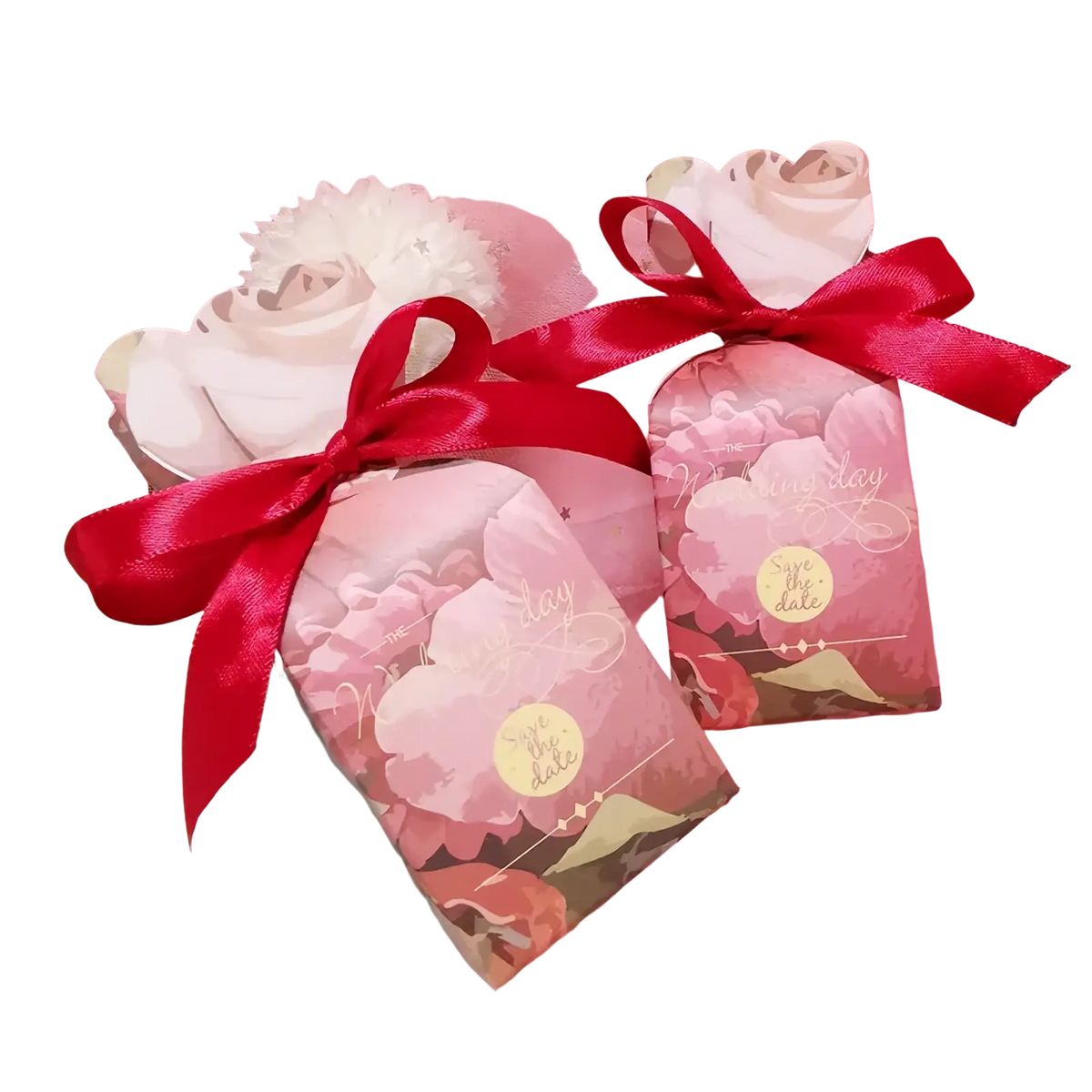Pink floral-patterned save the date gift bags with red satin ribbons for floral wedding favor boxes with ribbons