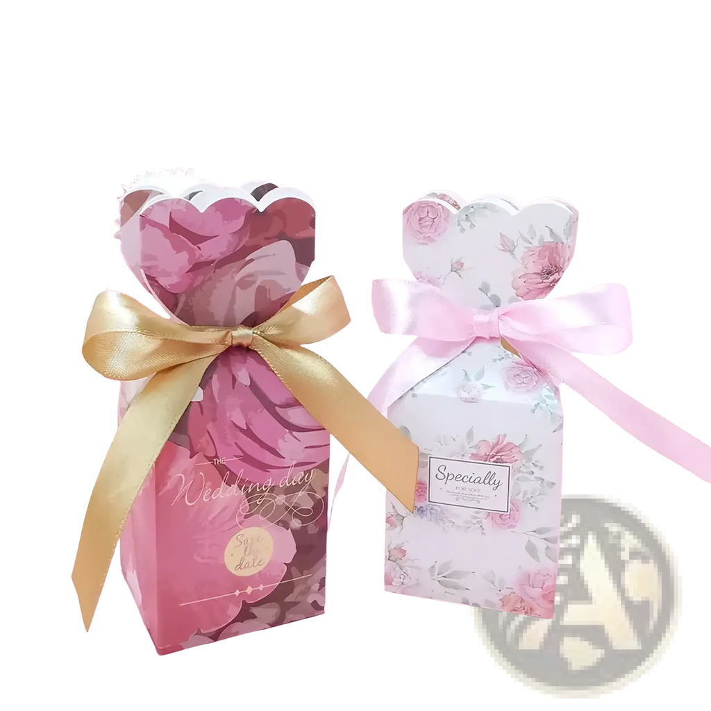 Floral wedding favor boxes with pink and white flowers adorned with satin ribbons for elegant gift packaging