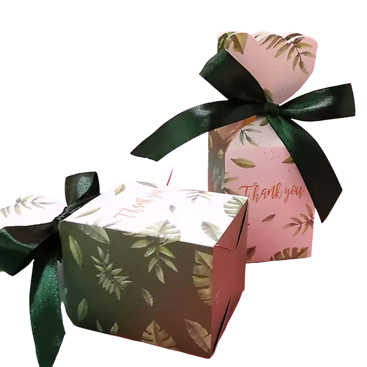 Floral wedding favor boxes with ribbons in dark green and light pink paper featuring leaf patterns and black glossy ribbons