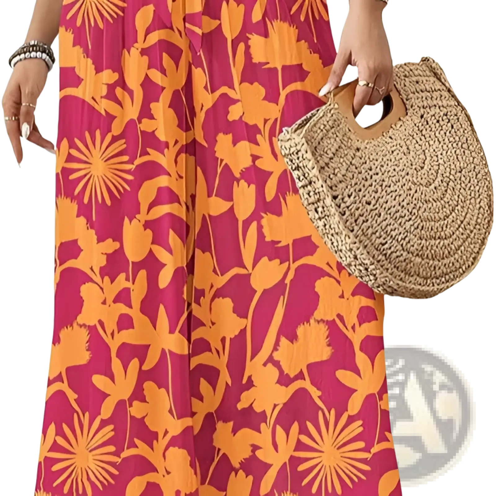 A woven straw handbag with a rounded shape and natural tan handles paired with floral wide-leg pants for women