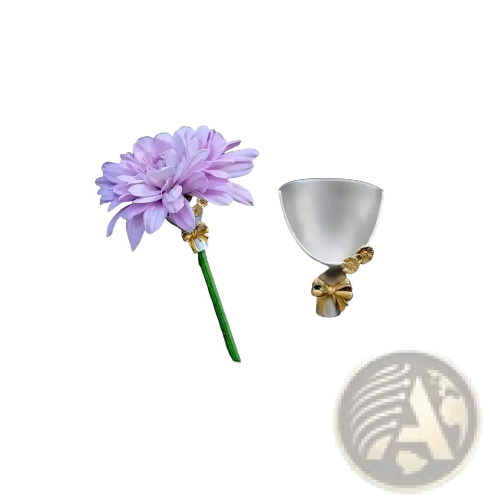 A delicate lavender flower brooch pin with green stem and gold bow beside a white ceramic cup with golden accents