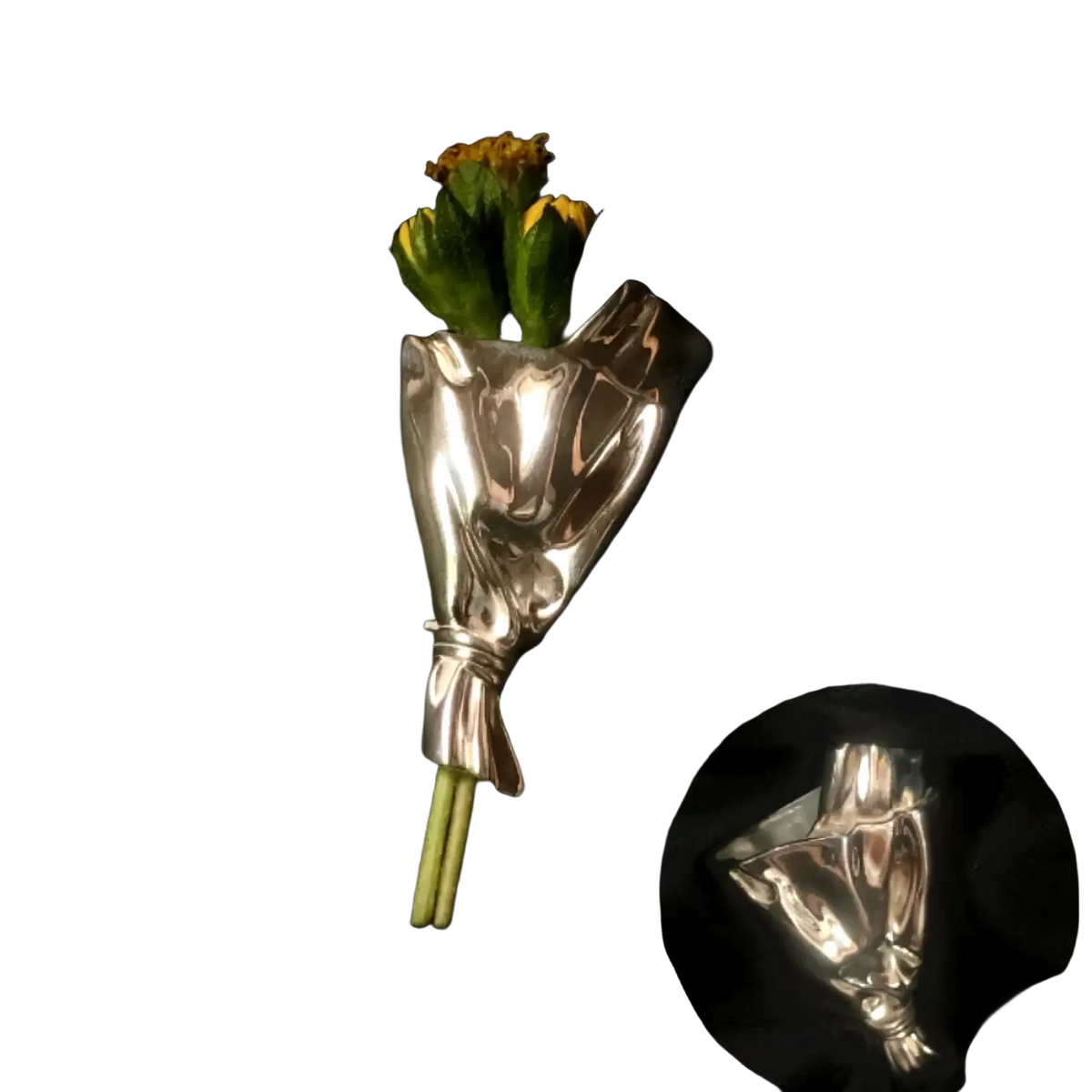 Silver metallic flower brooch pin designed as a hand holding yellow flowers for creative corsage accessory use