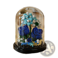 A blue lego flower arrangement displayed under a clear glass dome in a flower building blocks display case