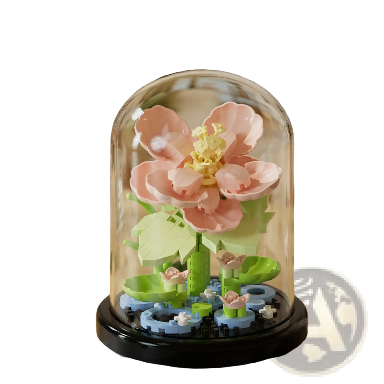 A delicate pink lego flower arrangement with green leaves and yellow centers encased in a clear glass dome display case