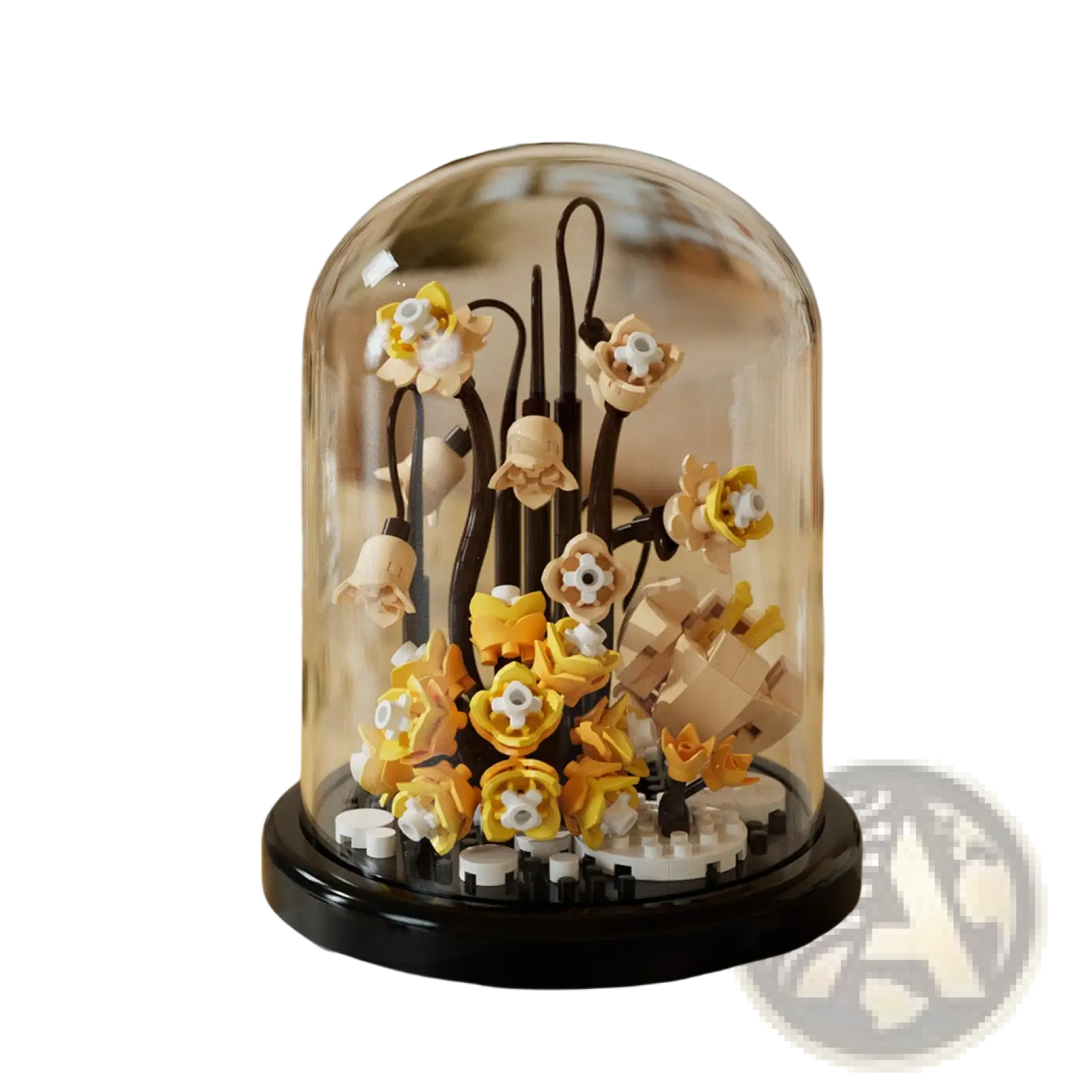 Delicate yellow and cream flower building blocks arranged under a clear glass dome display case
