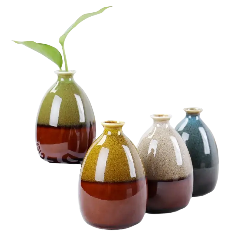 Four flower glaze ceramic vases with glossy two-toned glazes in green-brown, mustard-yellow, beige, and teal-blue for home decor
