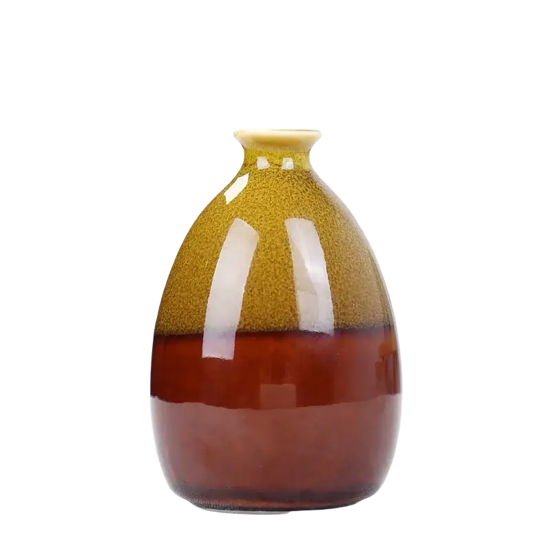 Flower glaze ceramic vase with glossy gradient amber to deep brown glaze, rounded body, and narrow neck for home decor