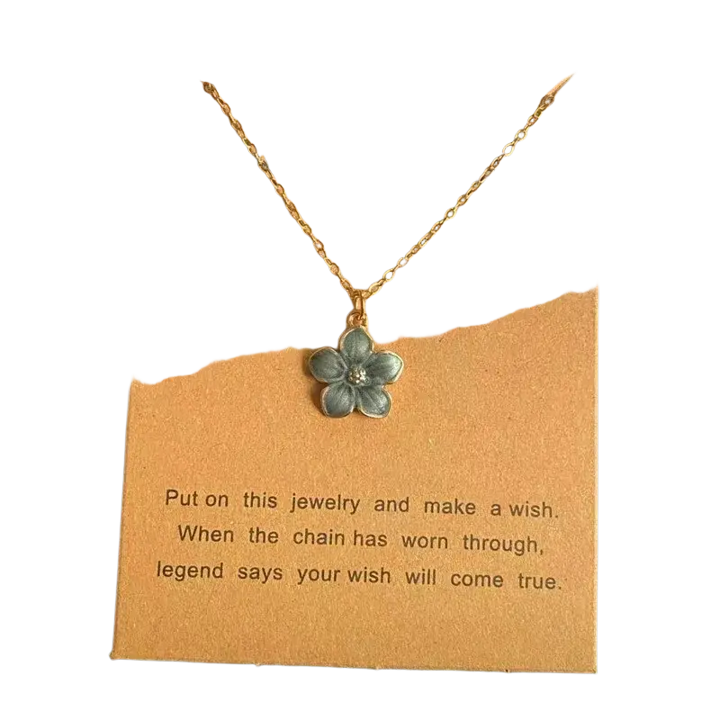 Delicate gold link chain flower pendant necklace with blue gray enamel and clear stone for cute romantic style