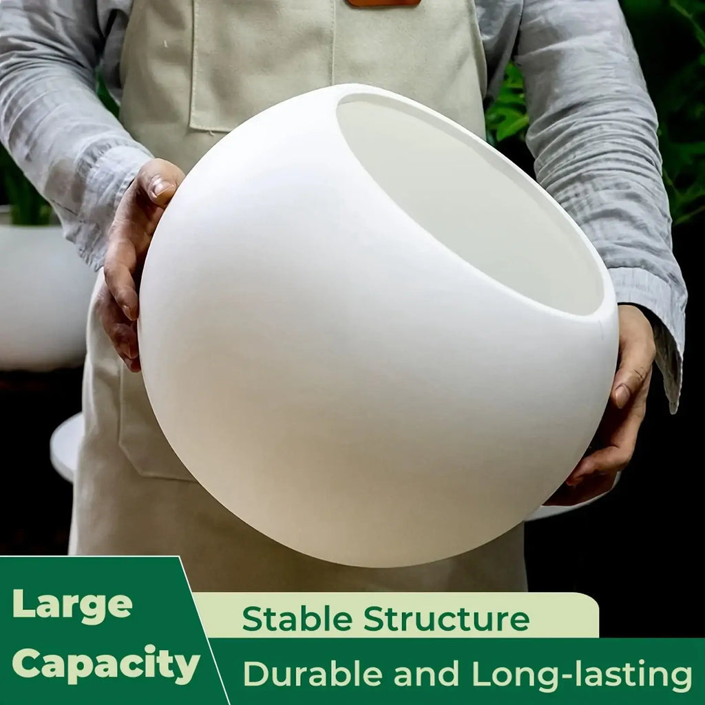 White ceramic flower pot with smooth rounded bowl shape open top ideal for home flower planting indoors or outdoors