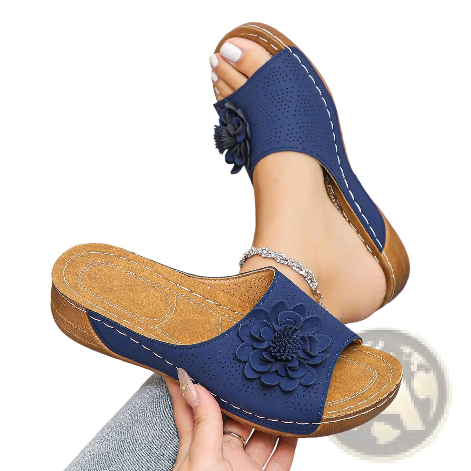 Blue perforated leather wedge sandals with decorative flower appliqué for retro beach wear