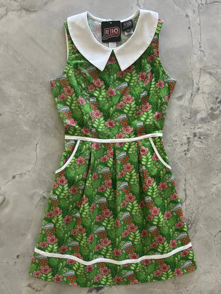 Green floral print sleeveless cotton dress with white peter pan collar and trim in retro a line style