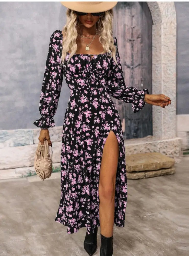 Floral square neck slit maxi dress with long sleeves in black fabric featuring delicate pink blossoms and a high slit