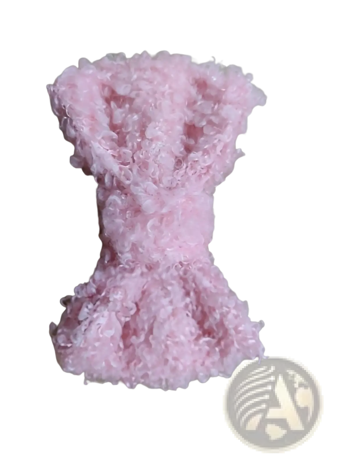 A delicate pink textured knit dress with a flared skirt and fitted bodice paired with a fluffy bow hair clip cream sheepskin