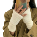 Fluffy fingerless knit gloves cream featuring white fluffy yarn and a ribbed knit cuff for comfortable wear