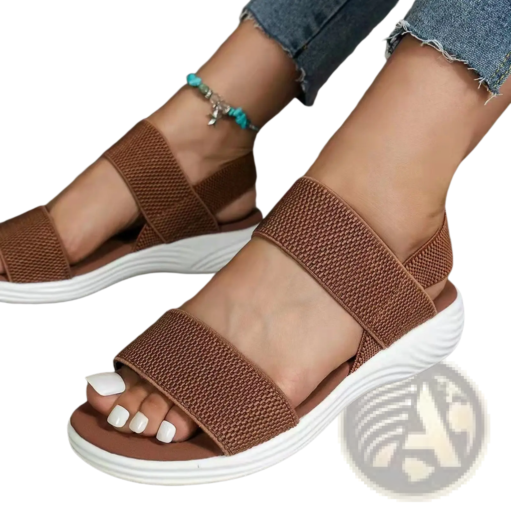 Brown flyknit elastic back strap flat sandals with woven straps and white cushioned sole for women
