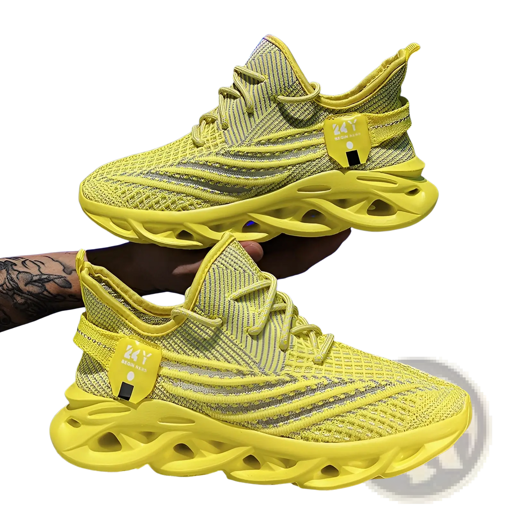 Vibrant yellow flyknit mesh platform running shoes for men with bold sculpted sole and matching laces